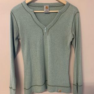 Nice long sleeve tee button up in the front.